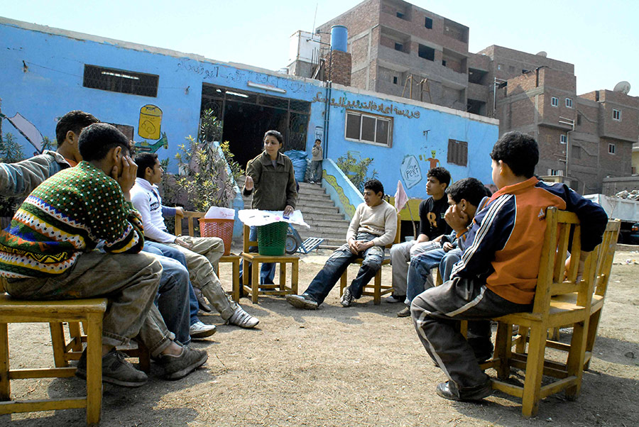 Someone giving a demonstration on recycling