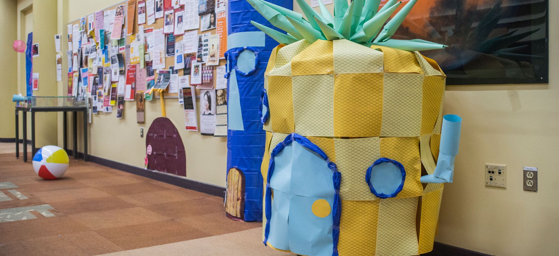 Paper models of Sponebob Squarepants's pineapple home decorate the KINSC