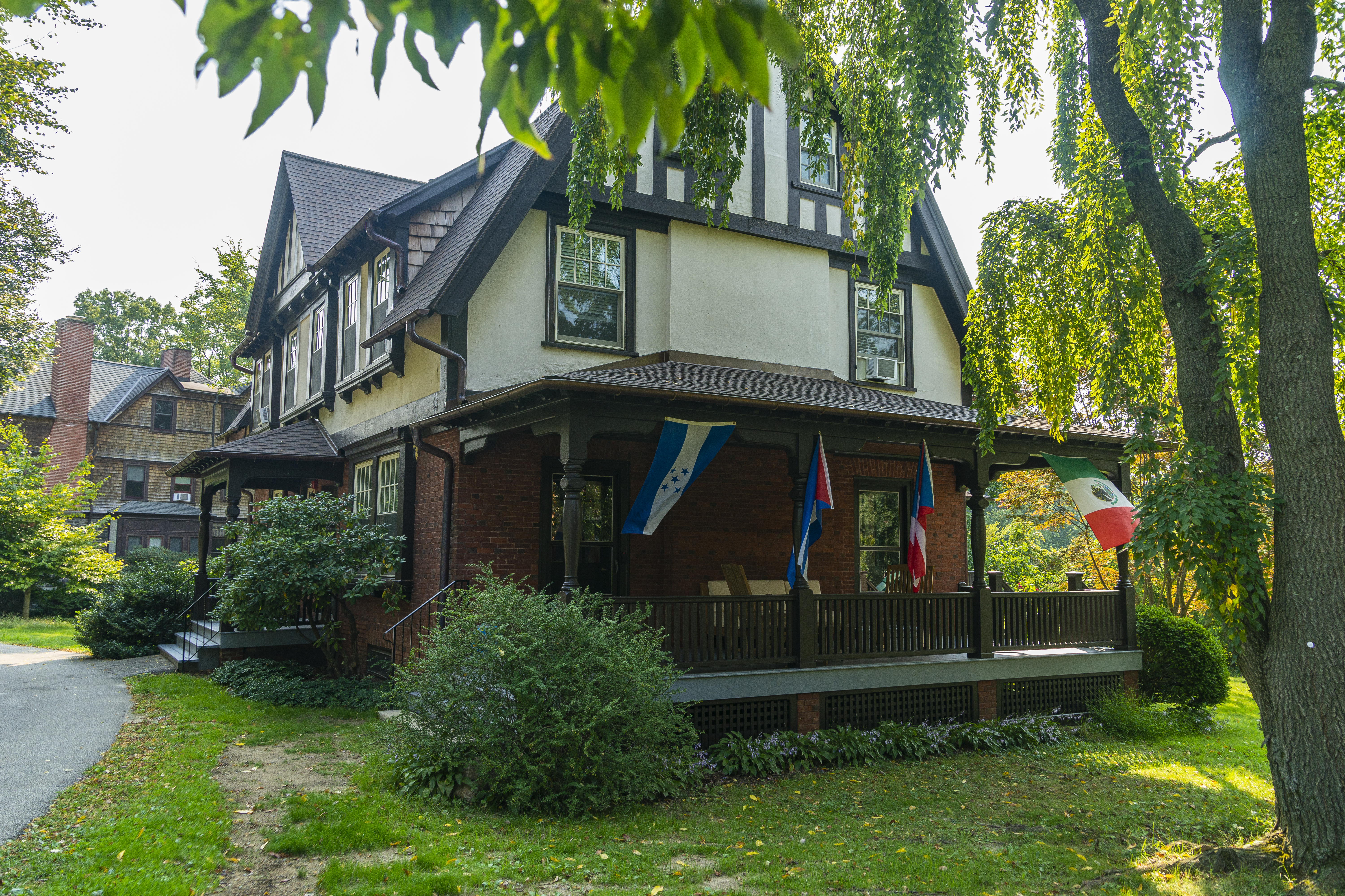 The outside of the tudor-style house where the Latinx Center is located
