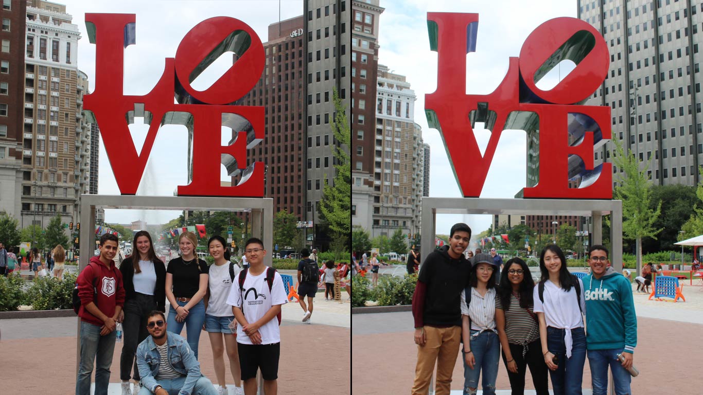 international students pose with the famous LOVE statue in philly