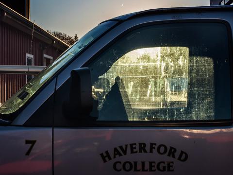 Photo of a Haverford College truck at sunset