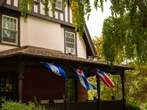 Latinx Cultural Center Building with 3 flags