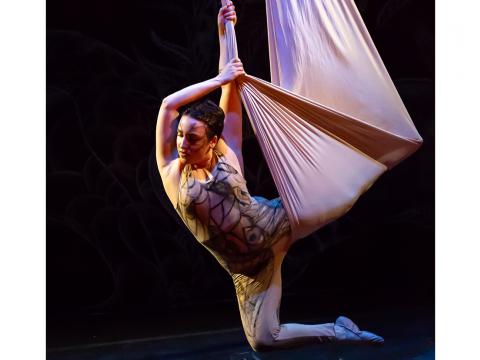 Amancay (Candal Tribe) Kugler performs aerial silk acrobatics for her circus company.