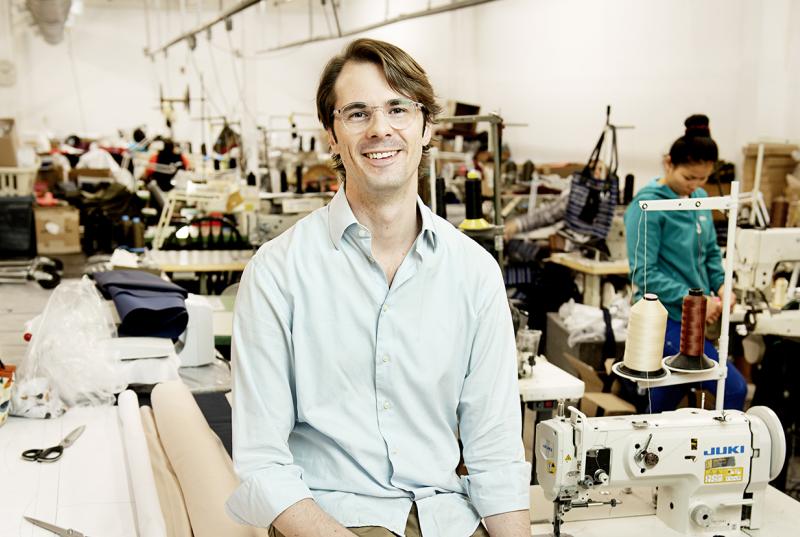 Griffin Vance in the factory where his environmentally conscious clothing line is made