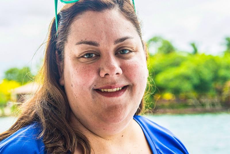 Kristen Whalen smiles in front of the water on her class' trip to Honduras.