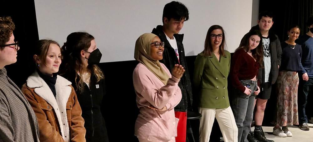 Students in Zeynep Sertbulut's Visual Studies course Race and Representation in Documentary Film answering questions about their final film projects in the VCAM screening room. Photo: John Muse.