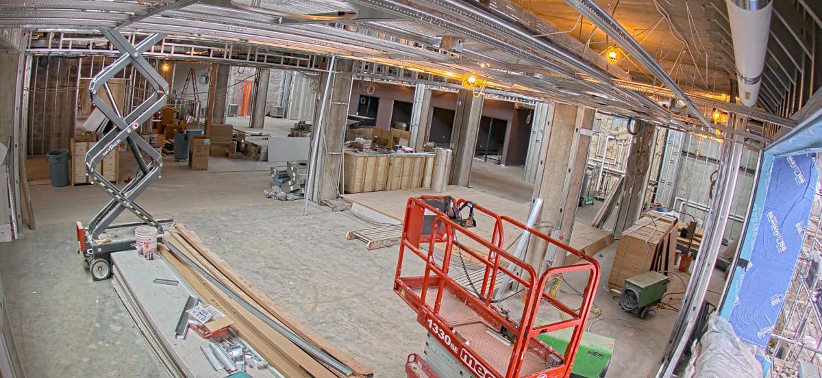 interior of the library under construction, featuring an extended cherry picker.