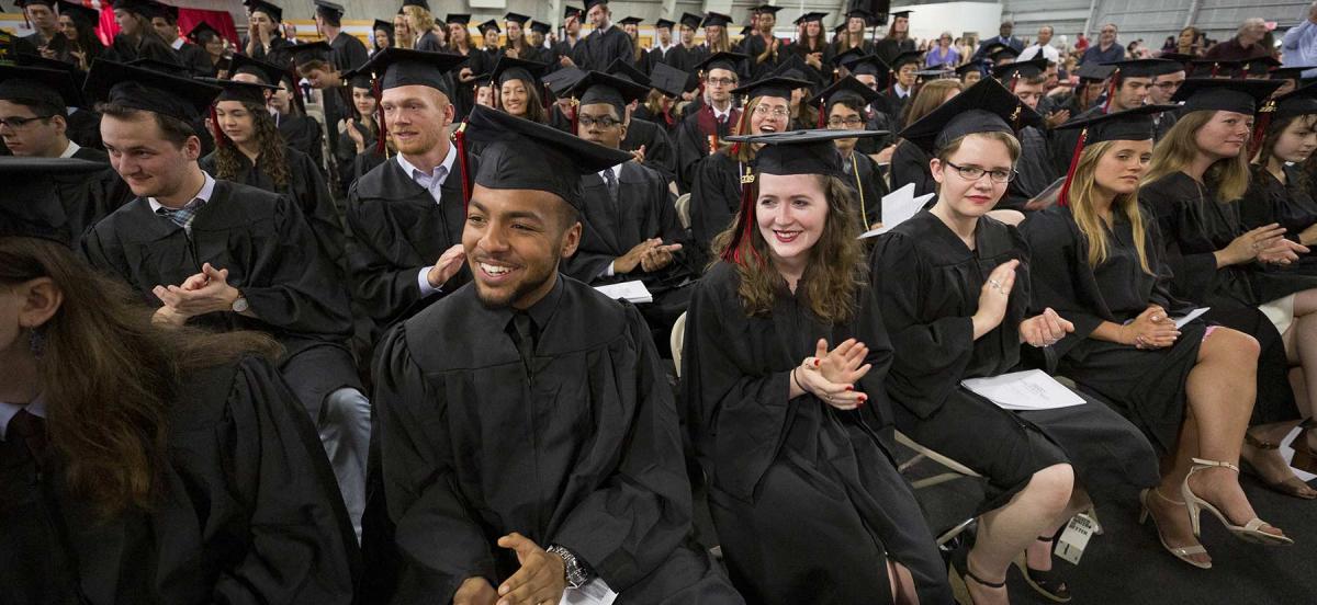 Students in graduation regalia during commencement