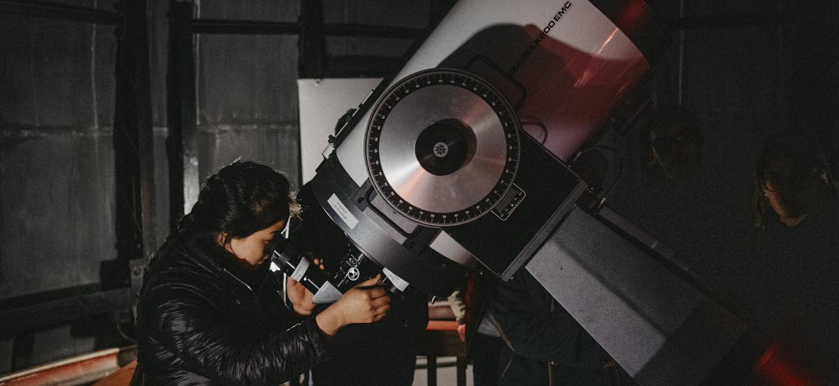 Students using a 16-inch Schmidt-Cassegrain telescope