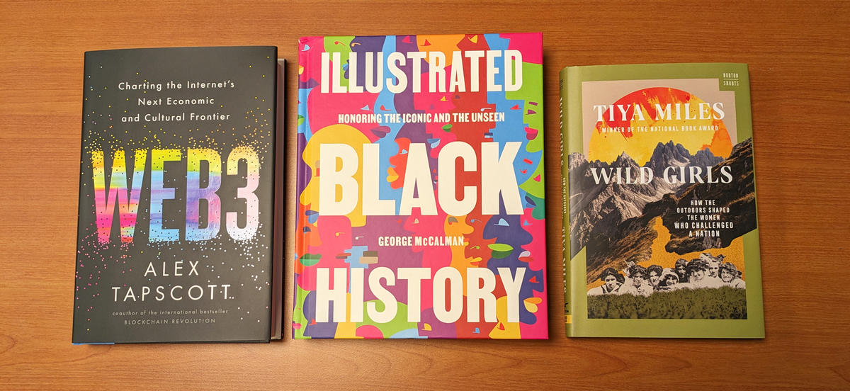 Photo of three books. Web3 features the title in a multicolor font disintegrating into pixels. Illustrated Black History features a bright abstract silhouettes. Wild Girls features a photo collage of a group of girls and mountains in the background. 