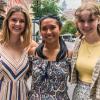 Eleanor, Kayla, and Madeline are dressed in nice clothes standing on a New York street.